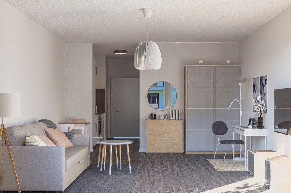 Helles, modern möbliertes Apartment in Damp — offener Wohn-/Schlafbereich mit Küchenzeile